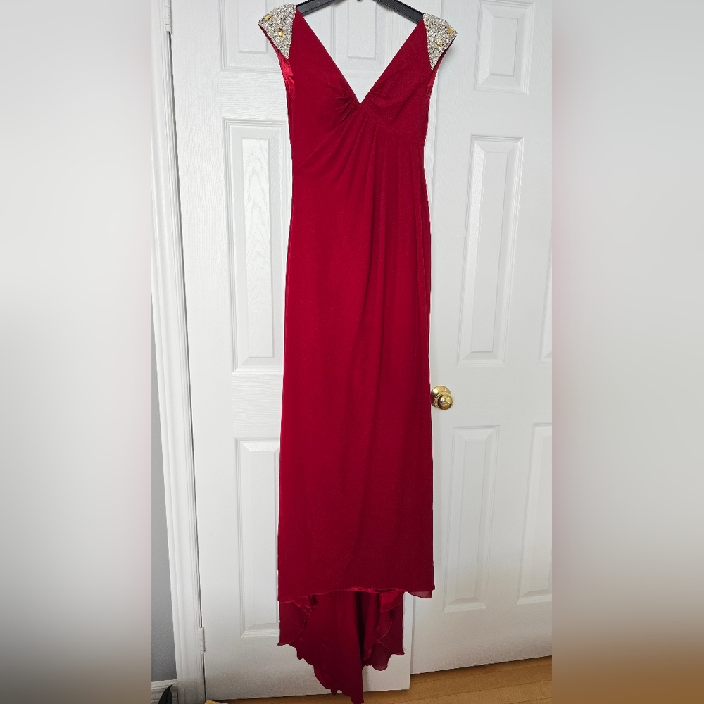 new, never wore Evening dress/ wedding gown in red with stones on shoulders